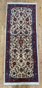 A modern hand-knotted Persian Sarouk runner, central field with scrolling palmettes and foliate