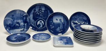 A collection of Royal Copenhagen blue and white plates from 1980-2003, comprising 'Jingle Bells'