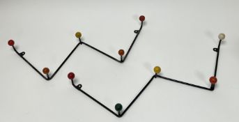 A pair of retro vintage mid 20th century sputnik atomic coat hooks of 'W' shape in black with