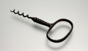A 19thc steel oval handled corkscrew: l. x 15cm w. x 7.5cm