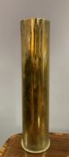 A WW1 brass artillery shell casing stick stand, of cylindrical form with circular opening: H. 50cm