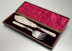 An Edwardian pair of epns engraved mother-of-pearl handled fish servers: l. x 29cm in original red