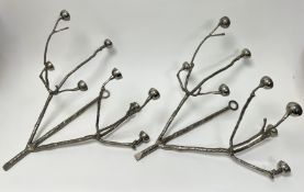 A pair of nickel-plated brass candleholders, modelled as branches, each holding eight candle holders