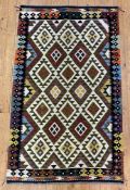 A hand-knotted Maimana kilim rug, central panel with repeating diamond design enclosed within a