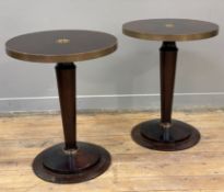 A pair of modern mahogany lamp tables, veneered circular top with brass edge, raised on pedestal