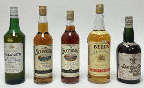 A bottle of Black & White special blend of Buchanan's Choice Old Scotch Whisky, distilled blended,