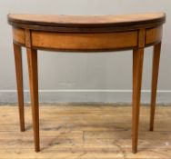 A George III satinwood demi-lune card table, inlaid and crossbanded top over baize-lined playing