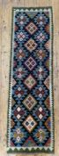 A hand-knotted Maimana kilim runner, central panel with repeating geometric and diamond motifs, deep