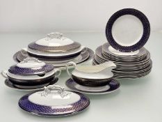 A Wedgwood Imperial Porcelain colbalt enamelled edge with gilt foliate pattern part dinner service
