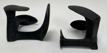 A pair of cast iron cobblers shoe lasts, one with 'The Home Ruler' to side (h. 16cm) (2)