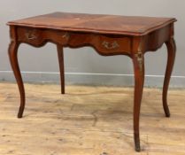 A modern Louis XV-style writing table, serpentine front with inlaid and crossbanded top, over frieze