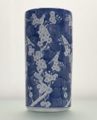 A Chinese blue and white ceramic stick stand, in a blossoming cherry tree with birds design. (h-