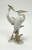 A German Hutschenreuther Kunstabteilung figure group in the form of a pair of herons on reeds,