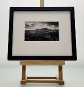 A black and white photograph of Eildon Hills, in a glazed frame. (7.5cmx12.5cm)