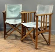 A pair of wood-framed folding director's chairs, 20th century, of characteristic form, each with