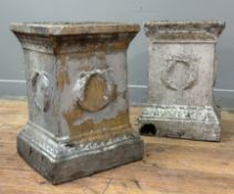 A pair of painted weathered stoneware garden urn stands, of square section, each side moulded with a