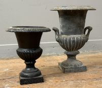 Two small cast-iron campana urns, the larger with twin handles. Height of larger 34cm (2)