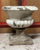 A weathered painted ceramic campana form garde urn. 55cm by 52cm.