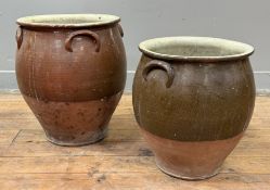 Two salt-glazed terracotta jars, of amphora form, each with moulded handles. (2) Heights 43cm and