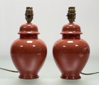 A pair of cermamic red glazed baluster table lamps (h-26cm). (2)