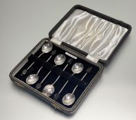 A Birmingham set of six bean handled coffee spoons: l. x 10cm in original black velvet lined box