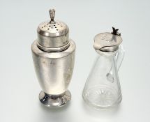 A George VI Birmingham silver Art Deco-inspired tapered cylinder domed top table sugar castor on a
