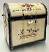 A vintage style wine chest of arched-top form, decorated in the manner of a traditional French