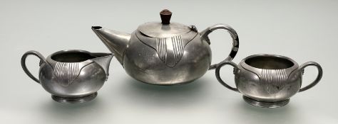 A three piece pewter art deco 