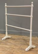 A painted pine three-bar towel rail: H. 87cm L. 80cm D. 27cm