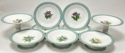 An early 20thc porcelain dinner service, comprising twelve plates (d. 22cm), three compote plates,