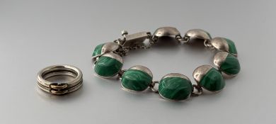 A Mexican silver malachite mounted nine panel bracelet with clip fastening: d. x 8cm 38.2g