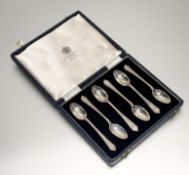 A Mappin & Webb Sheffield silver set of six tea spoons: l. x 11cm in original black velvet and satin