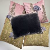 A collection of throw cushions comprising, a pair of pink silk style ground with silver beadwork