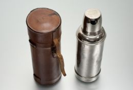 An English made aluminium metal thermos No.4421, with cyclidrical brown leather case, with J.E.G
