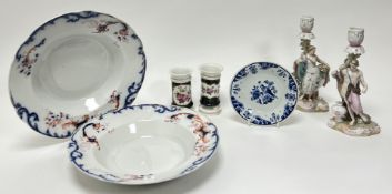 A pair of 19thc E.M & Co bowls decorated with scrolls in red and blue tones, with gilt detailing,