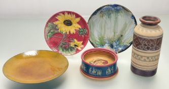 A collection of various decorative wares comprising, a V.S.B ceramic sunflower on pink glazed