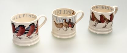 A trio of Emma Bridgewater half-pint mugs comprising Birds - Bullfinch, Birds - Robin and Fields &