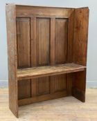 An early 20th century pitch pine hall bench, three-panel back with sides over plank seat: H. 114cm