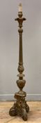 An Italian Baroque-style hardwood standard lamp, in the form of an altar candlestick, scrolling leaf