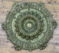 A Victorian gilt brass ceiling rose, moulded with repeating circular foliate design: D. 77cm