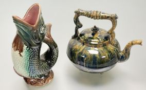 A gluggle jug in a majollica style glaze (h-25cm) together with a Scottish Pottery tin glazed