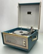 A Dansette Bermuda record player with a Monarch turntable, untested (l. 42cm)