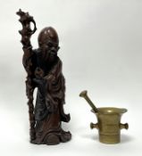 A Chinese hardwood carved figure of Shou Lao, the God of Longevity (h. 43cm), together with a