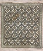A hand-woven textile panel throw, lattice-style central panel with repeating floral bouquet motif,