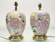 A pair of modern Chinese baluster shaped table lamps with blossoming floral sprays in a yellow