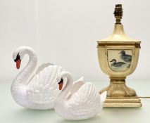 A graduated pair of 1950's Dartmouth Devon ceramic swan planters with orange beaks (marked verso) (