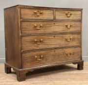 A George III mahogany chest of drawers, fitted with two short over three graduated long drawers