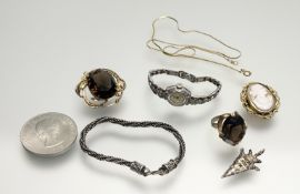 A gilt metal dress ring set oval smoked glass stone N together with a silver rope bracelet with s
