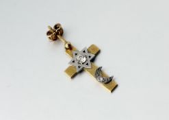 A yellow and white metal mounted cross pendant/ earring set a round brilliant cut diamond