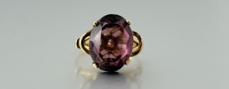 A 9ct gold cocktail ring set oval facet cut amethyst approximately 5ct P 4.26g